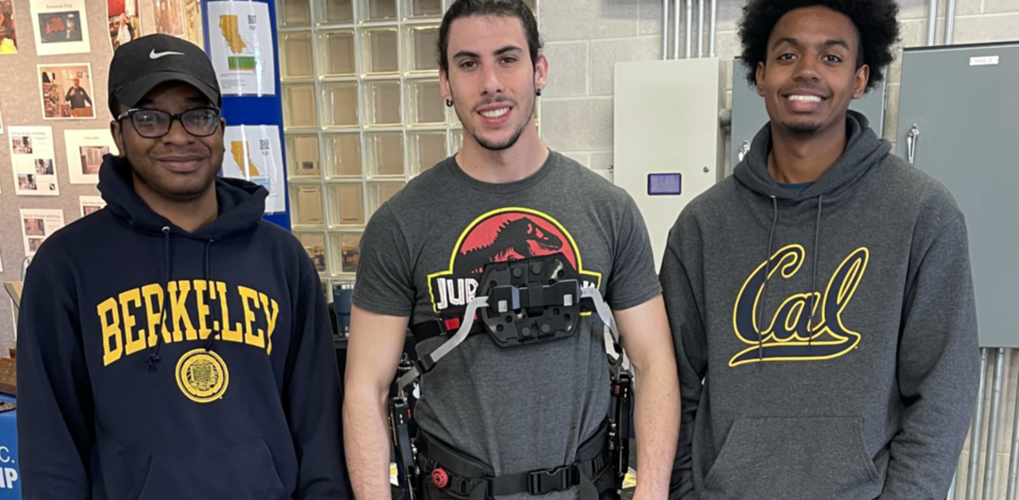 Sean Phillips and Isaiah Barajas-Smith promote exoskeleton research at the Mason Development Center training